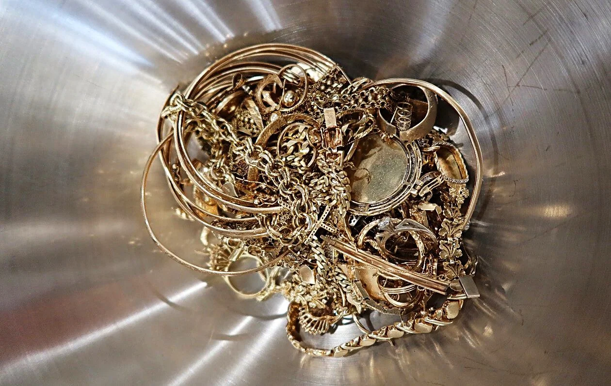 A single afternoon of scrap gold. Broken chains, single earrings, class rings, and tangled bracelets are all worth money.