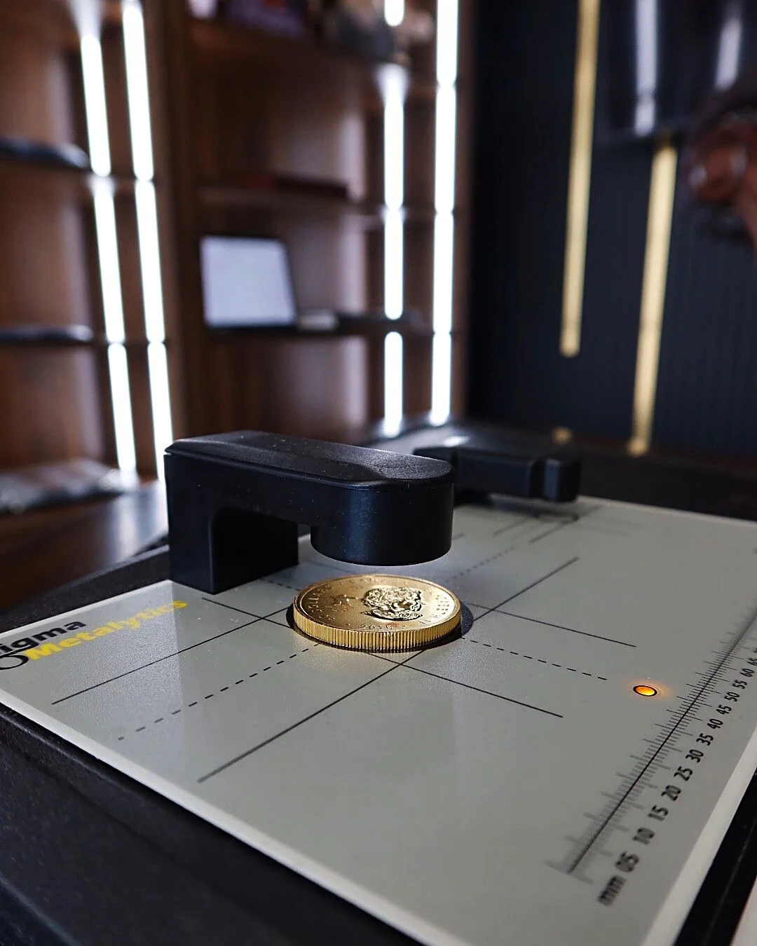 Sigma Precious Metal Verifier testing a gold coin